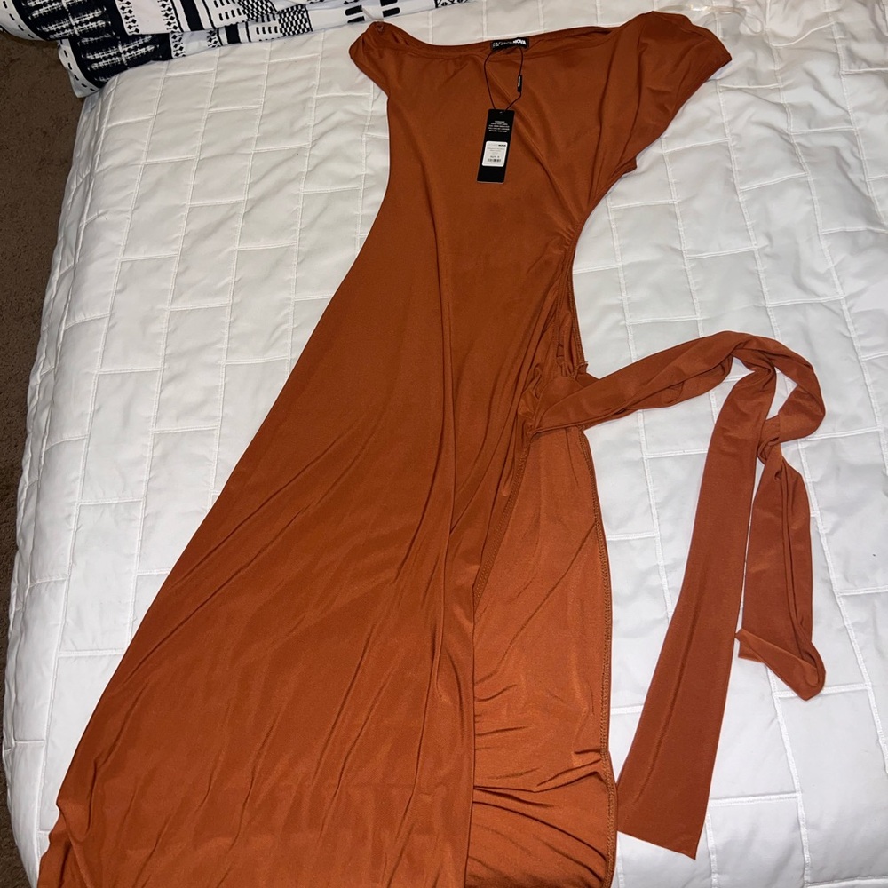 Very long beautiful sundress with whole split on one side of the dress .